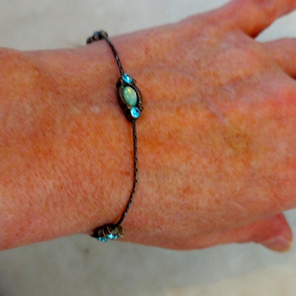 Park Lane copper colored chain bracelet/anklet with with blue rhinestones.